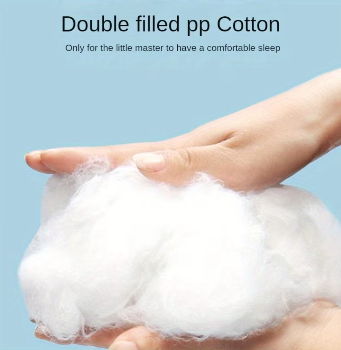 Hand holding double filled PP cotton with a blue background